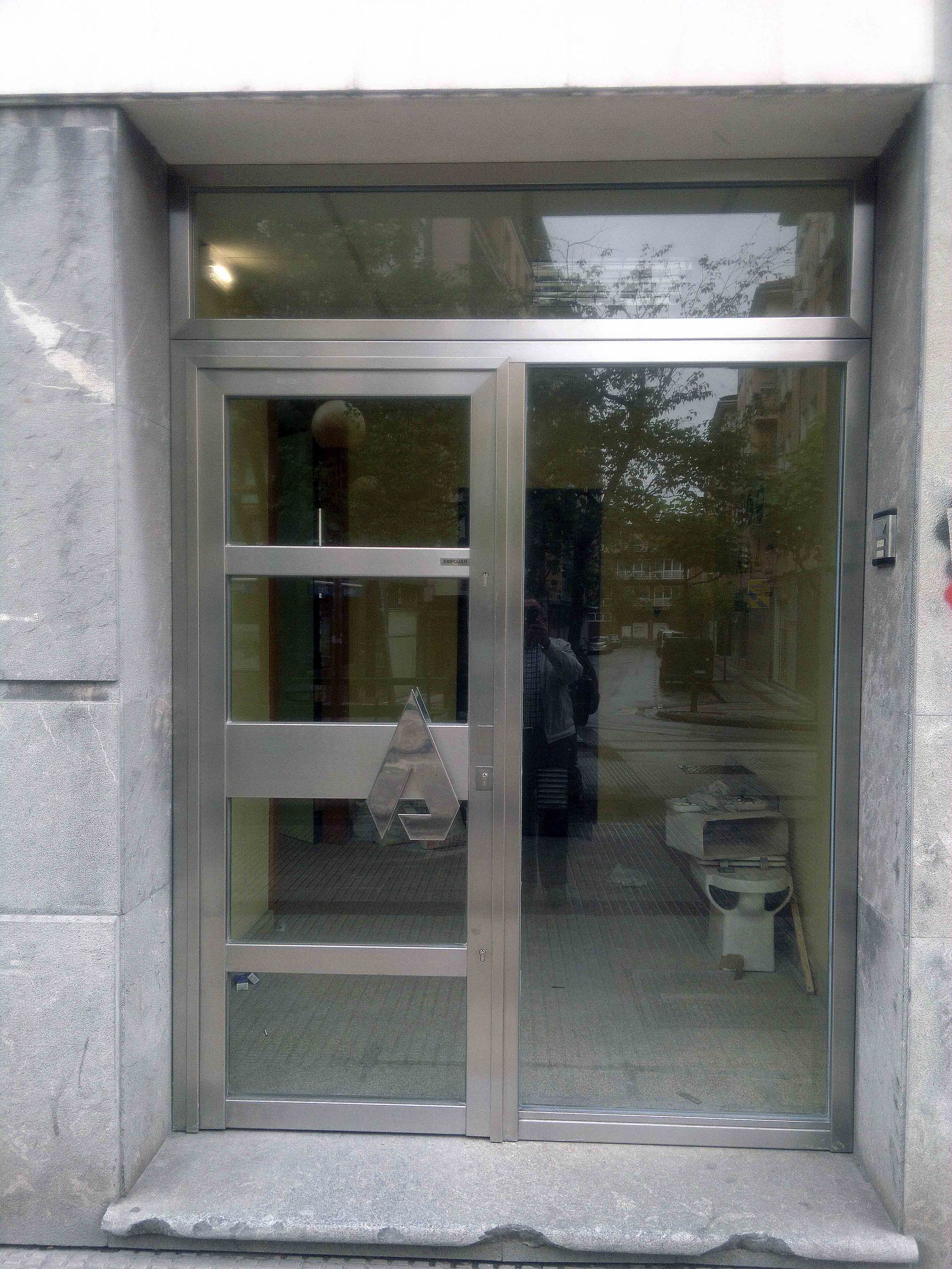 Puerta-1H+F-moldura-vidriada-acero-inoxidable